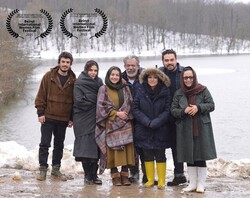 Director Farnush Samadi (3rd R) and cast members pose in an undated photo.