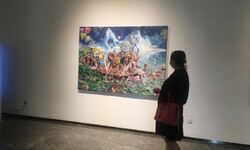 An art aficionado visit the art exhibition “The Legend of Persia Art” at the Powerlong Art Center in Shanghai on August 5, 2021. (Global Times/Du Qiongfang”