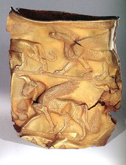 Golden cup depicting griffin on top band. Excavated at Marlik, Gilan, Iran. The first half of the first millennium BC.