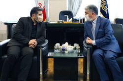 New culture minister Mohammad-Mehdi Esmaeili (L) and his former counterpart, Seyyed Abbas Salehi meet at his office in Tehran on August 26, 2021.
