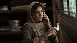 Vishka Asayesh acts in a scene from the Iranian drama “Badger”.