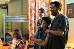 Shahab Hosseini (R) and his co-stars in a scene from “Any Day Now”.