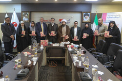Writer Mohammadreza Sarshar (5th L), some El Faro and Sureh-Mehr managers and the Bolivian and Cuban envoys in Tehran attend a session at the MNA office on November 13, 2021 to unveil the Spanish tran