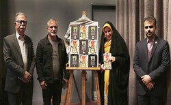 Writer Mehri Gholampur (2nd R) and several literati attend a meeting at the National Museum of the Islamic Revolution and Sacred Defense on November 15, 2021 to unveil her novel “57 Days”.