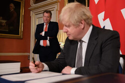 Shock resignation heaps pressure on UK Premier 