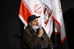 Jamal Shurjeh speaks at a ceremony held in Tehran on January 14, 2022 at the Film Museum of Iran to honor the filmmaker for his lifetime achievements.