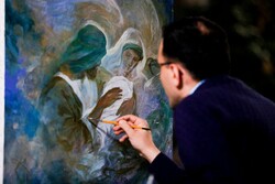 Hassan Ruholamin works on his new painting about the birth of Hazrat Fatima (SA) at his atelier on January 23, 2022.