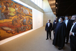 President Ebrahim Raisi accompanied by several cultural officials visits an exhibition of 14th Fajr Festival of Visual Arts at the Tehran Museum of Contemporary Art on February 10, 2022. (President.ir