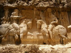 Help! Tang-e Chogan bas-reliefs, majestic treasures of Sassanid art, under invasion of lichens, fungi, and leaky rocks