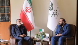 IRGC Aerospace Force chief Amir Ali Hajizadeh meets Farabi Cinema Foundation director Mehdi Javadi on April 22, 2022. (FCF)