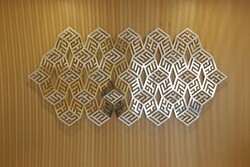A file photo shows a calligraphic artwork by Karl Schlamminger at the Ismaili Centre, London.