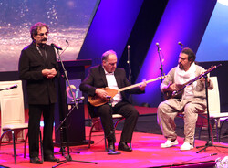 Vocalist Shahram Nazeri and musicians Farid Elhami and Saber Nazargahi perform during the 25th Galawej International Festival in Sulaimaniyah, Kurdistan Region, on May 28, 2022.