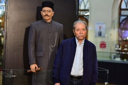 Actor Ali Nasirian poses with his wax effigy at the Film Museum of Iran on July 11, 2020. (FMI)