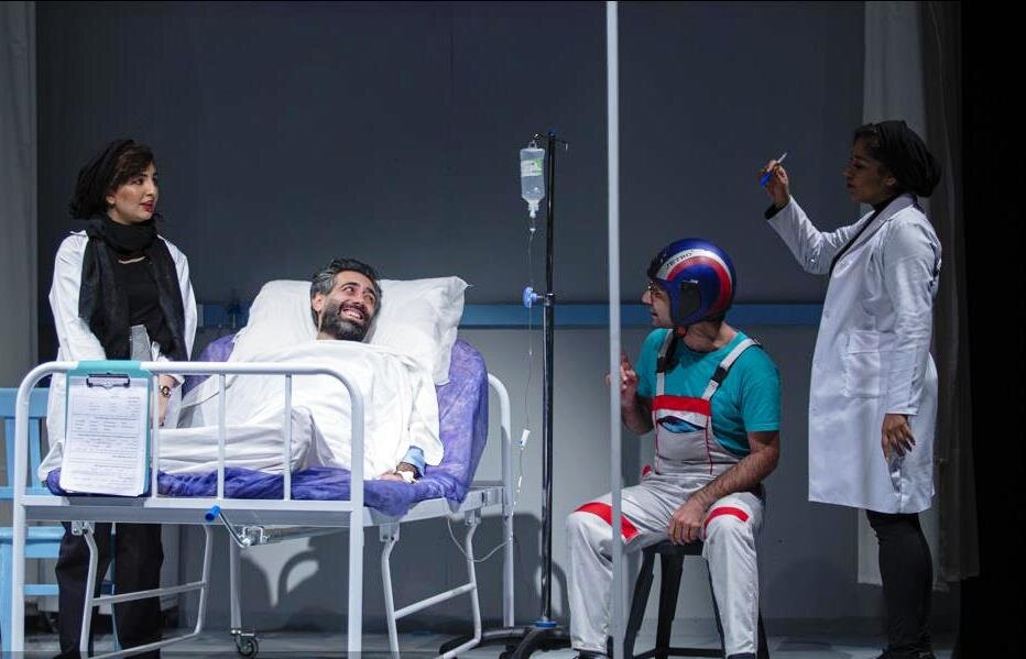 Members of director Saeid Heshmati’s cast perform “Whose Life Is It Anyway?” at the Shahrzad Theater Complex in Tehran on July 17, 2021. (Tehran Picture Agency/Parto Joghatai)
