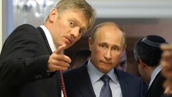 Putin and Kremlin spokesman Peskov