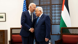 Joe Biden and Mahmoud Abbas shake hands