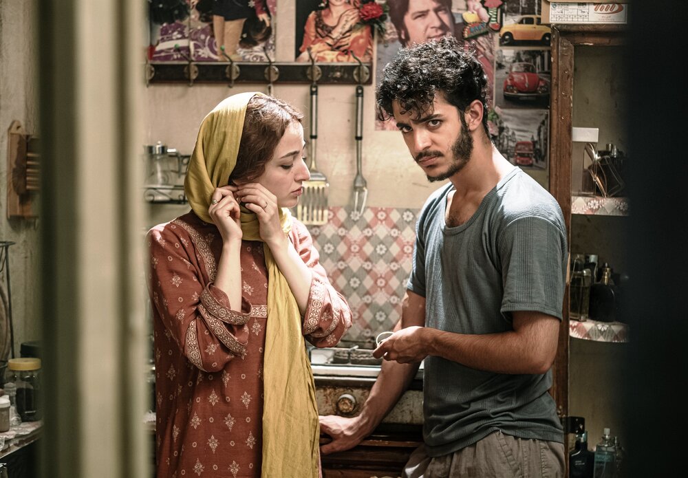 Neda Jebraili and Ali Shadman act in a scene from “Drowning in Holy Water”.