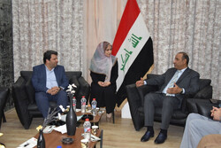 Cinema Organization of Iran director Mohammad Khazaei (L) and the Iraqi Minister of Culture, Tourism and Antiquities, Hassan Nazim, meet in Baghdad on July 24, 2022.