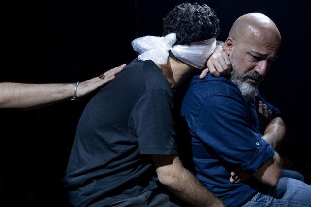 Navid Mohammadzadeh and Amir Aqai act in a scene from “Beyond the Wall” directed by Vahid Jalilvand.