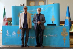 Maestros Nasir Heidarian (L) and Majid Entezami attend a press conference at Tehran’s Vahdat Hall on July 31, 2022 to brief the media about the National Orchestra’s concerts in September. (Honaronline