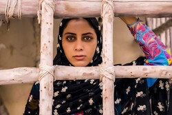 Mona Farjad acts in a scene from the Iranian movie “Sea Boys”.