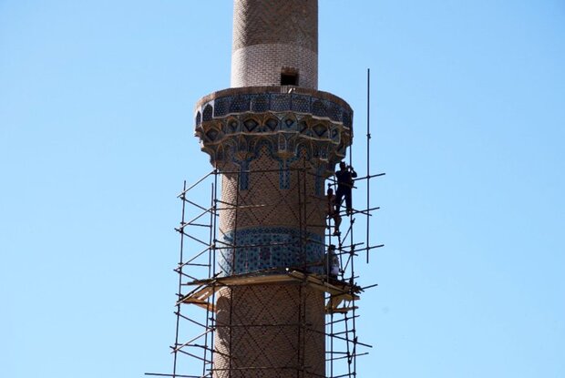 Ancient mudbrick minaret restored as routine maintenance
