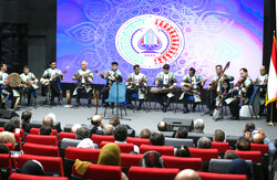 An ensemble performs a concert during a Tajik cultural festival at the Abbasabad Cultural Complex in Tehran on October 3, 2022. 