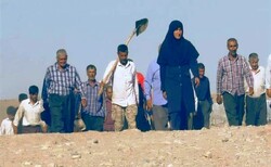 This still shows Salimeh along with some villagers in a scene from “My Harvest Season”.