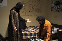 Roya Afshar and Erfan Ebrahimi act in a scene from “Maman”.