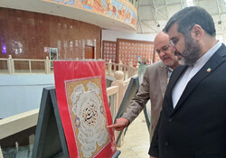 Minister of Culture and Islamic Guidance Mohammad-Mehdi Esmaeili (R) visits an exhibition by Iranian artists at the National Museum of Tajikistan in Dushanbe on November 1, 2022.