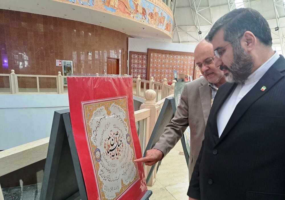 Minister of Culture and Islamic Guidance Mohammad-Mehdi Esmaeili (R) visits an exhibition by Iranian artists at the National Museum of Tajikistan in Dushanbe on November 1, 2022.