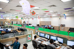 This film photo shows Iranian animators working at a studio of the Institute for Intellectual Development of Children and Young Adults – Kanoon. (Kanoon/Hamid Tavakkoli)
