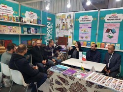 Cultural figures attend a meeting in Iran’s pavilion at the 39th International Istanbul Book Fair in Turkey, December 6, 2022, to launch the Turkish editions of several Iranian writers’ books. 