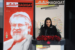 Filmmaker Nader Talebzadeh’s daughter, Maryam, speaks during a tribute the Cinéma Vérité festival paid to her father at Tehran’s Mellat Cineplex on December 12, 2022. (Mehr/Arshideh Shahangi)
