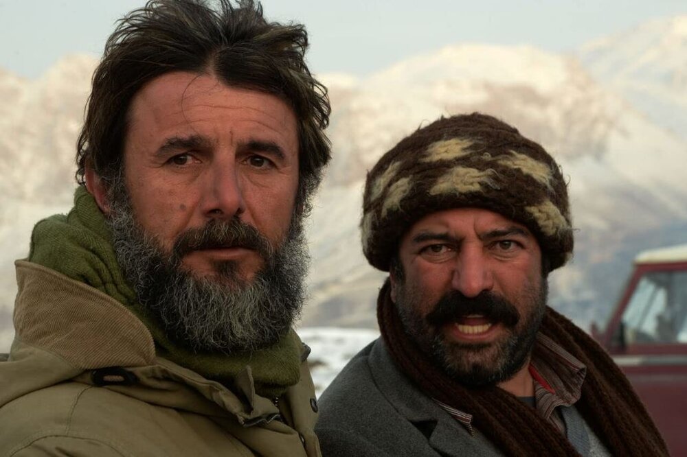 Amin Hayai and Majid Salehi act in a scene from “The Last Snow” by Amir-Hossein Asgari.