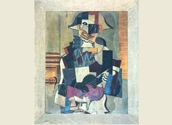 A print of Pablo Picasso’s “Harlequin Playing the Guitar” that is preserved in the Islamic Section of the National Museum of Iran.