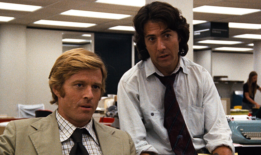 Robert Redford and Dustin Hoffman act in a scene from “All the President’s Men”.
