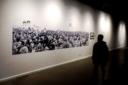 A man visits the exhibition “Mirrored Reflections” at the Tehran Museum of Contemporary Art on February 7, 2023. (ISNA/Hadi Zand)