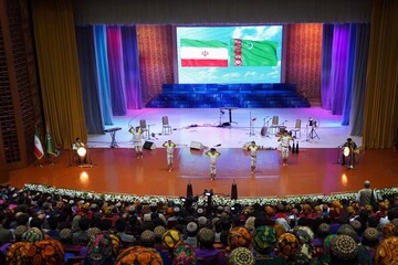 A group of Iranian acrobats performs during the opening ceremony of the Iranian Culture Days at the Palace of Mukams in Ashgabat, Turkmenistan, on February 12, 2023.