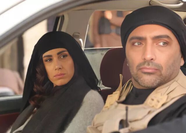 Sogol Tahmasbi and Amin Zendegani act in a scene from “Habib”.