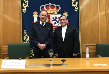 Ambassador Ghashghavi (L) standing beside CESEDEN chief Lt. Gen. Bisbal Pons