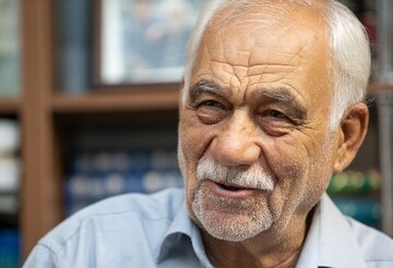 This file photo shows poet Abbasali Baratipur talking to Fars at his library on March 18, 2019. (Fars/Hossein Mersad)