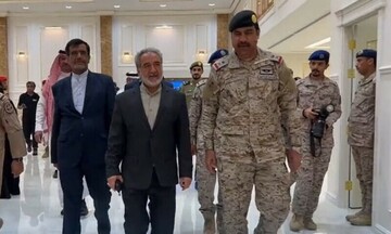 Iran’s charge d’affaires, center, meeting Saudis who helped evacuate Iranians from Sudan