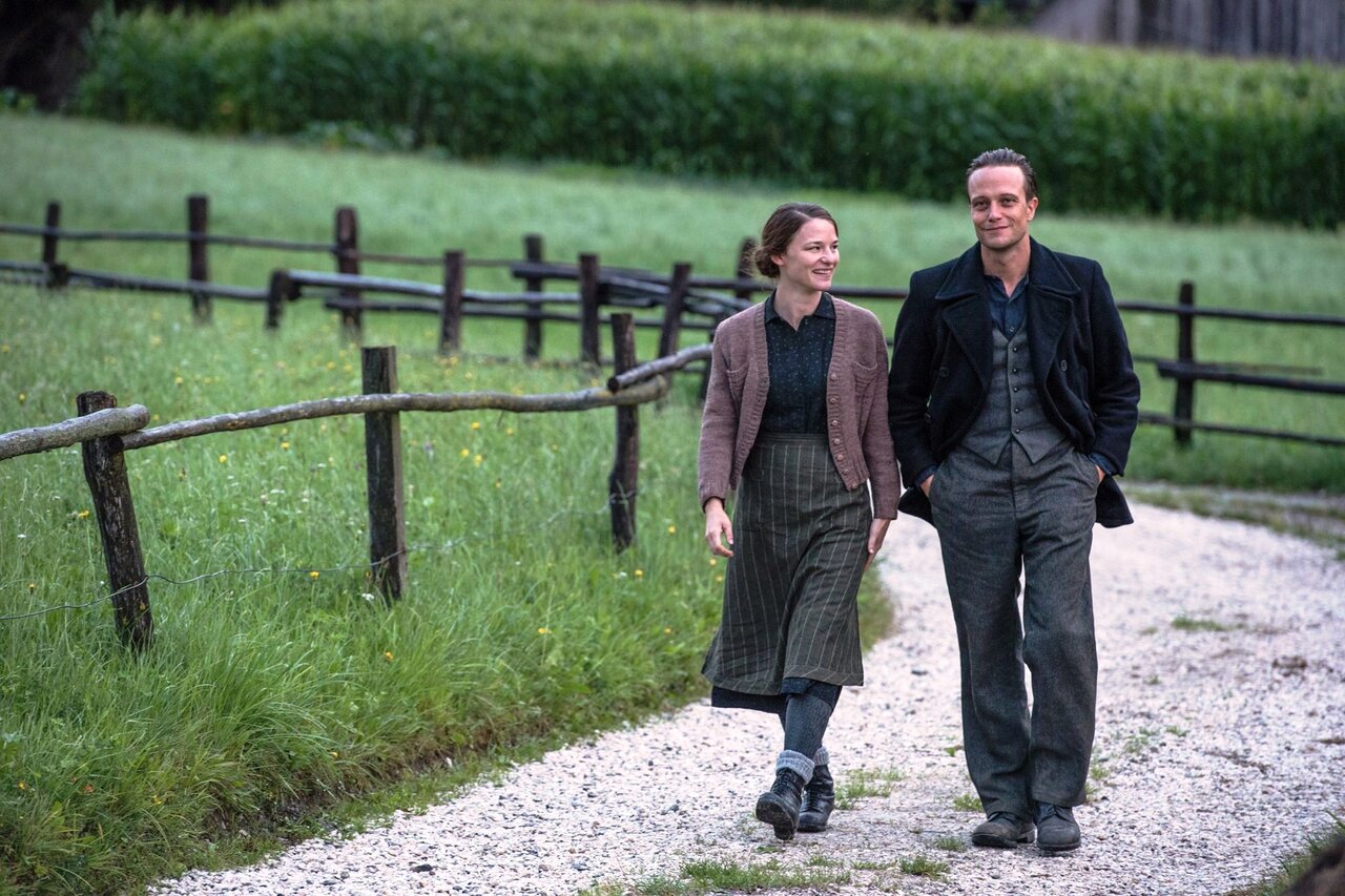 Valerie Pachner and August Diehl act in a scene of “A Hidden Life”.