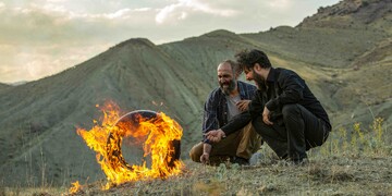 Hadi Hejazifar and Javad Ezzati act in a scene from “Atabai” directed by Niki Karimi.