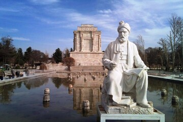 A file photo shows a statue of Ferdowsi near his tomb in Tus.