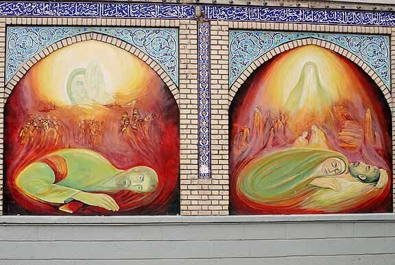 A file photo shows two murals by Nasser Palangi on a wall of the Khorramshahr Mosque.