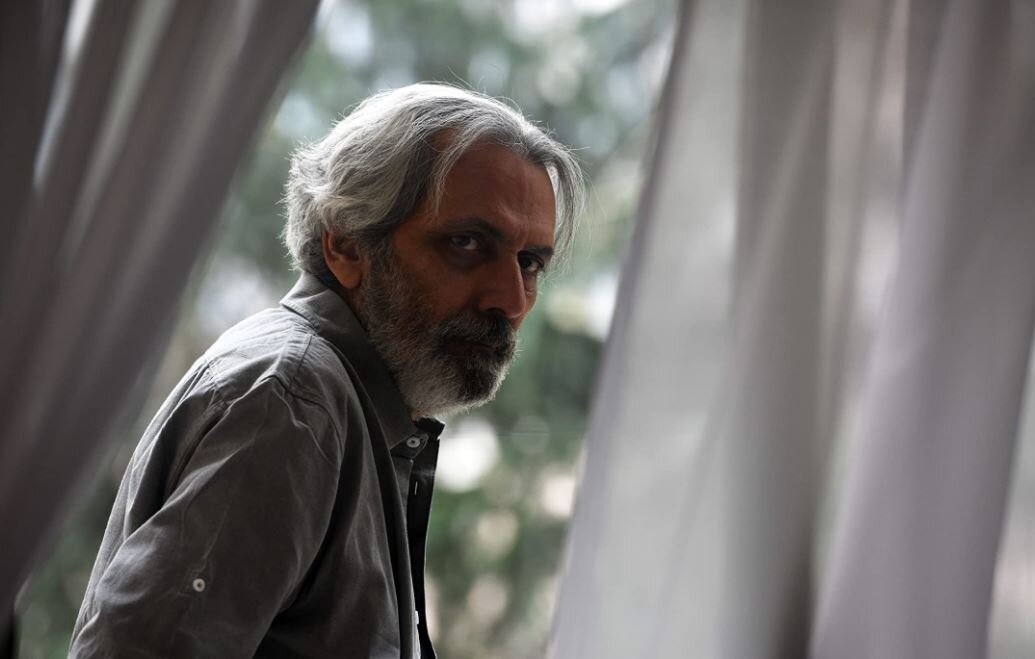 Farrokh Nemati acts in a scene from “The Annoyed” by Mehdi Fardqaderi.