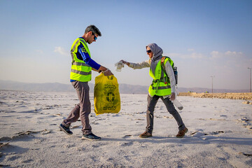 Collecting the waste at Maharloo Lake