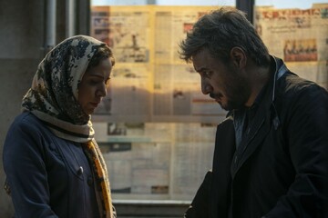 Setareh Pesyani and Javad Ezzati act in a scene from “The Leather Jacket Man”.